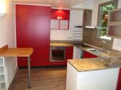 Philippe Nourisson, Menuisier- - agencement-decoration - catalogue-espace-cuisine - Cuisine rouge et granit