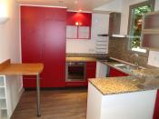 Philippe Nourisson, Menuisier- - agencement-decoration-interieur - catalogue-espace-cuisine - Cuisine rouge et granit
